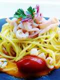 Spaghettini con calamari e crema di peperoncini tondi e acciughe