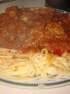 Una foto de Pasta con salsa de tomate al oporto