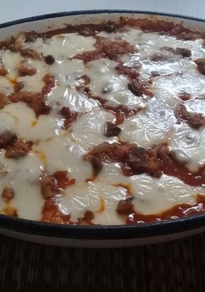 Una foto de Lasagna. Relleno: jamón y queso + salsa bechamel