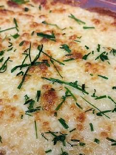 Una foto de Pastel de patatas, atún y queso