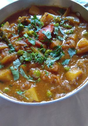 A picture of Cabbage, Peas, and Potato Curry.
