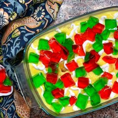 A picture of Fruit Custard 🍑🍎🥭.
