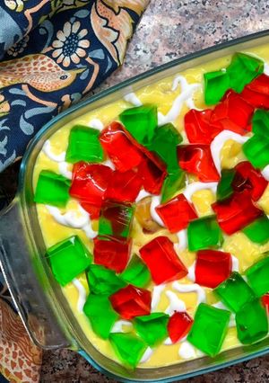 A picture of Fruit Custard 🍑🍎🥭.