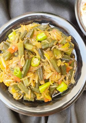 A picture of Fried Bhindi Pyaz 🍅🌶️🧅.