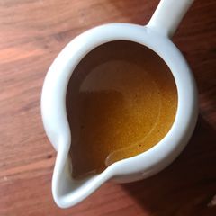 A picture of Apple cider and mustard dressing.
