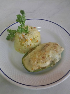 Una foto de Arroz con zapallo italiano relleno
