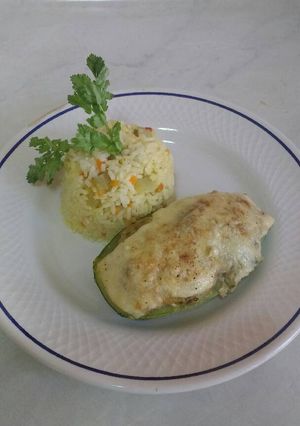 Una foto de Arroz con zapallo italiano relleno