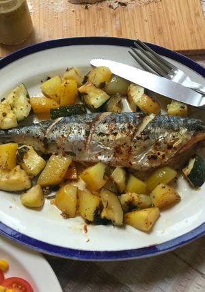 A picture of Roasted Mackerel with veggies.