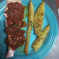 A picture of Yellowtail with Mediterranean Sauce.