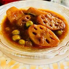 A picture of Lotus stems and peas sabji.