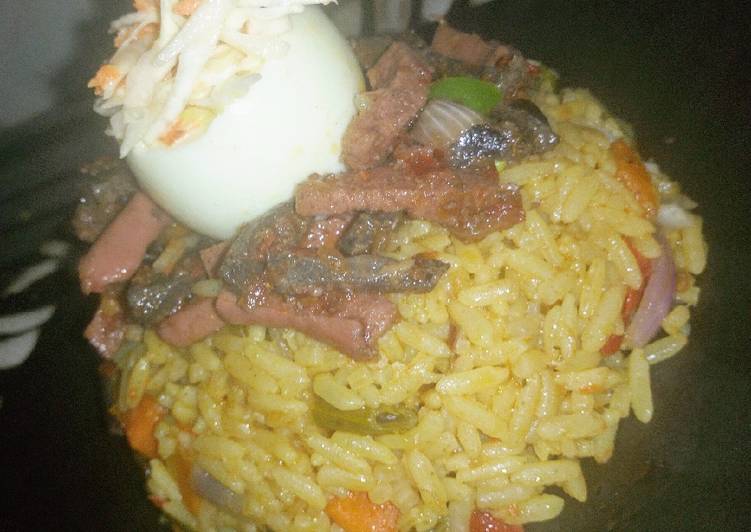Fried rice,peppered liver and sausage with coleslaw