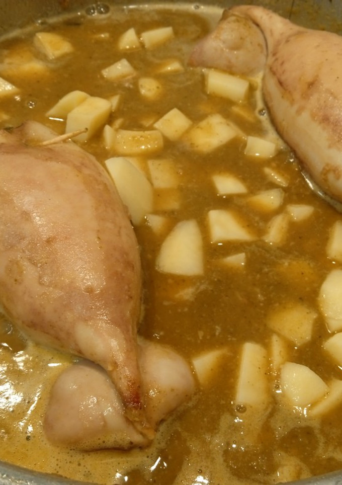 Una foto de Calamar relleno en su propia salsa