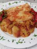 Filetes de merluza al horno con pimientos fritos