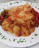 Filetes de merluza al horno con pimientos fritos