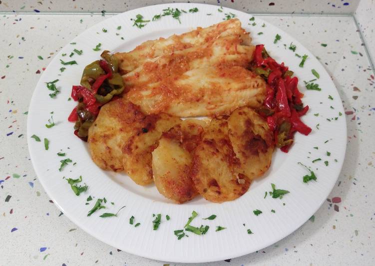Filetes de merluza al horno con pimientos fritos