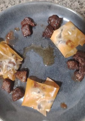 Una foto de Bocaditos de carrillada crujiente en su jugo