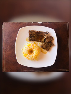 Una foto de Arrozin con bistec 🥩