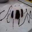 Negro en camisa en crema catalana
