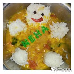 A picture of Simple dal rice with little Teddy.