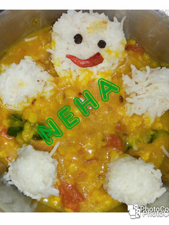 A picture of Simple dal rice with little Teddy.