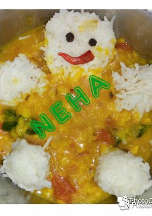 A picture of Simple dal rice with little Teddy.