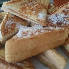 A picture of Peanut butter stuffed French toast..