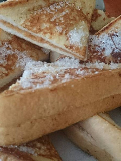 A picture of Peanut butter stuffed French toast..
