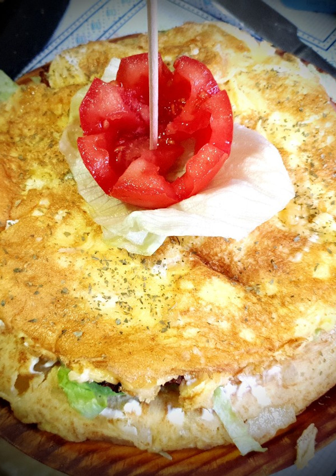 Una foto de Tortilla rellena con bacon y Philadelphia