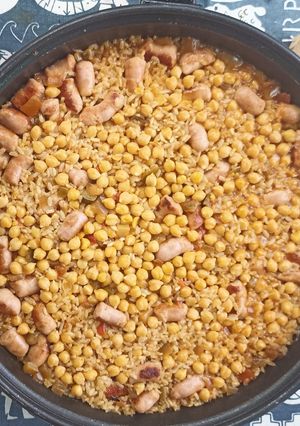 Una foto de Paella de longaniza