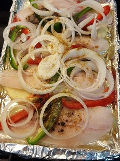 Una foto de Pescado al horno con vegetales