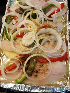 Una foto de Pescado al horno con vegetales