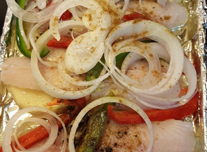 Una foto de Pescado al horno con vegetales