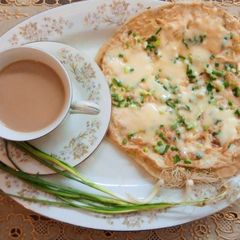 A picture of Hary lehsan ka cheese Anda paratha.