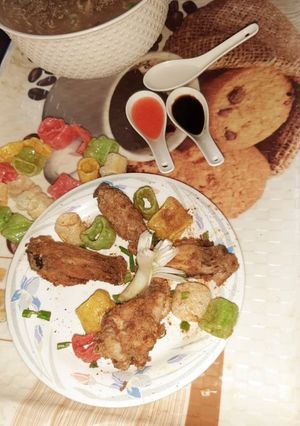 A picture of Chicken wings with chicken soup.