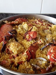 Una foto de Bogavante del Cantábrico con arroz