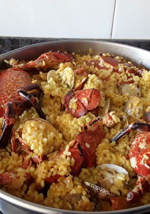Una foto de Bogavante del Cantábrico con arroz