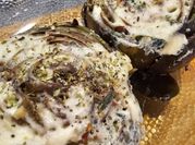 Una foto de alcachofas relleno de queso