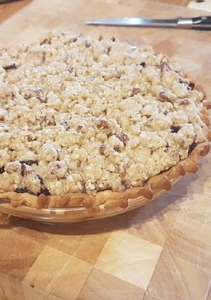 Una foto de Pay de manzanas y arándanos (blueberries)