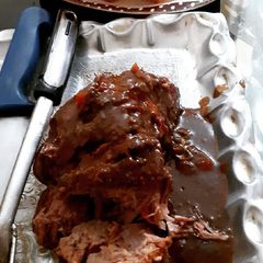 Roast beef with brown sauce A picture of Roast beef with brown sauce.