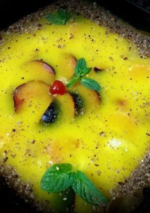 Une photo de Tarte à deux flan vanille et orange aux fruits de saison