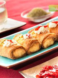A picture of Sweet phyllo rolls stuffed with ashta cream - znoud el sitt.