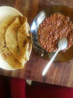 A picture of Chapati served with coconut beans# authormarathon#.