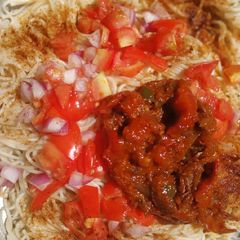 A picture of Spaghetti with palm oil.
