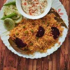 A picture of Peas pulao (Beetroot flavoured).