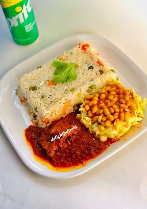 A picture of Vegetable white rice and stew 🍲.