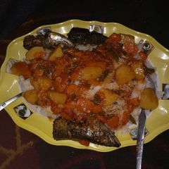 A picture of Rice with potatofish stew.