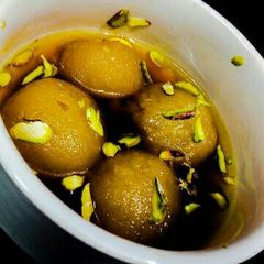 A picture of Dates Jaggery Rasgulla.