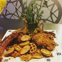 A picture of BIANCO MEATS - Cajun Fried Chicken an Andouille Sausage &Waffles.