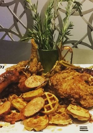 A picture of BIANCO MEATS - Cajun Fried Chicken an Andouille Sausage &Waffles.