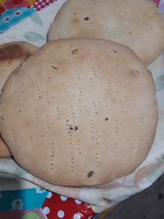 Una foto de Bollo con chicharrón tucumano